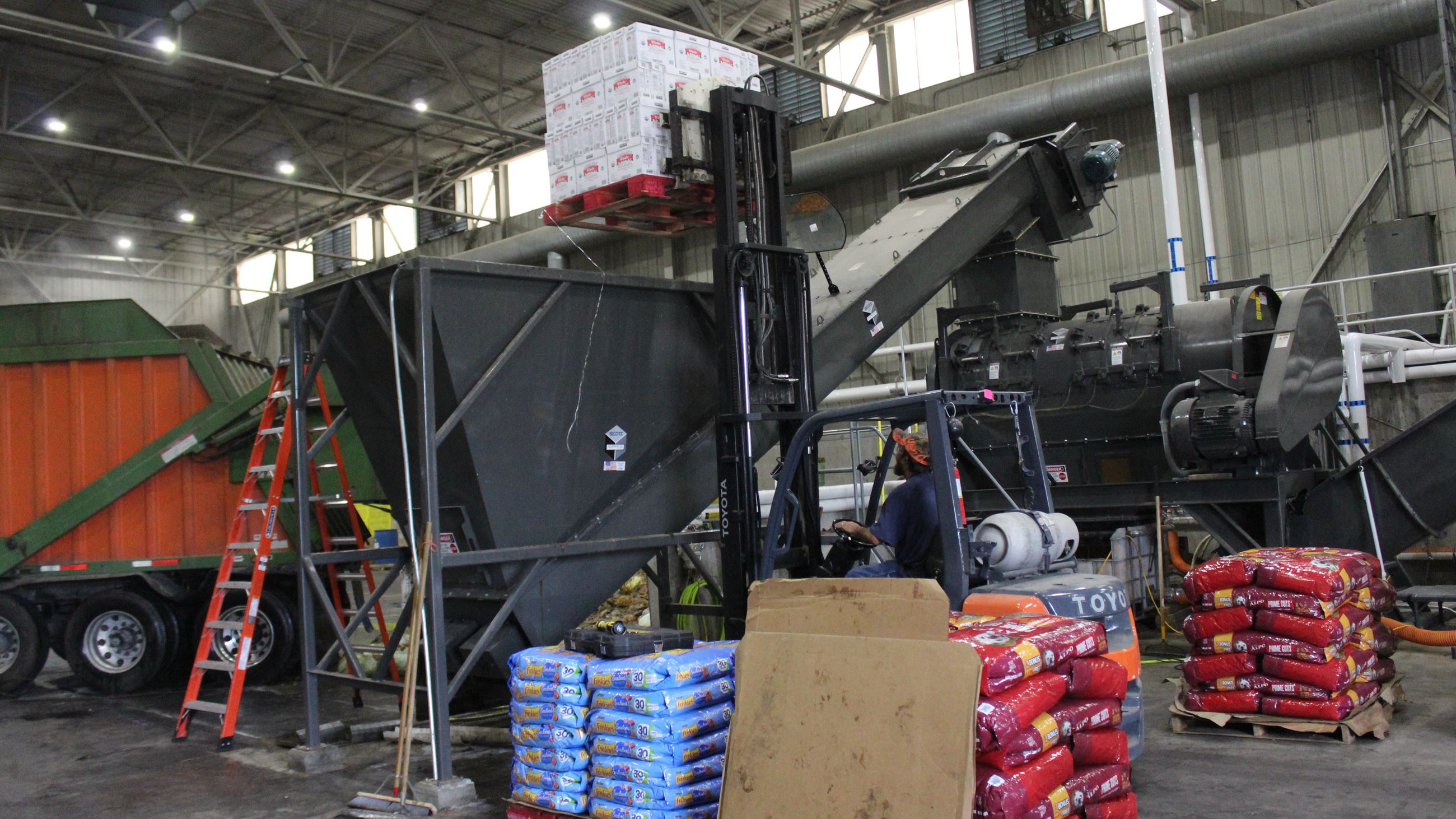 073020 MORC - Dumping product into depackager (JPG) A