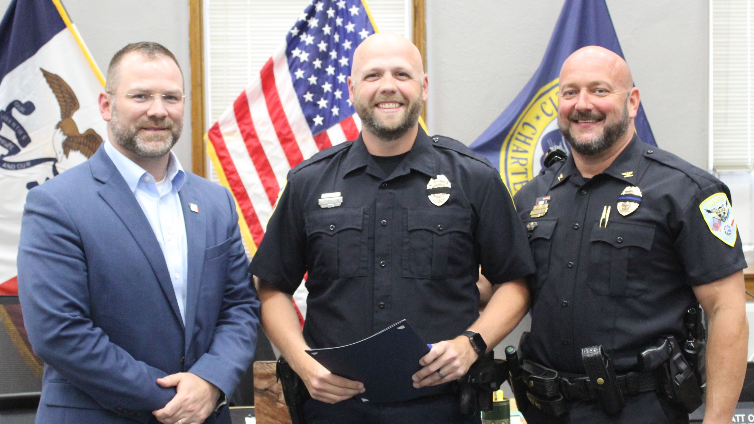 Mayor Brad Bark, Detective Britt Jameson, Police Chief Tony Kies Life Saving Award presentation