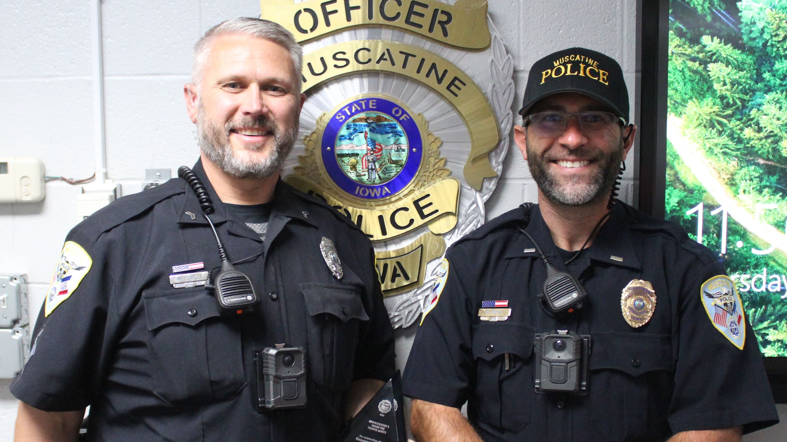 Commissioners Award shown by Corporal Matt Fowler and Lieutenant Ryan Buss (JPG) 06-13-24