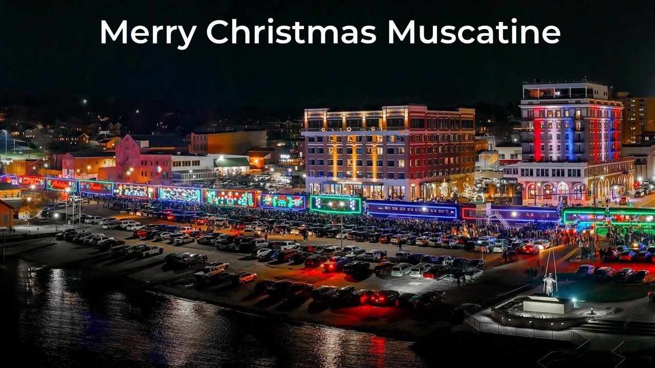 Merry Christmas Muscatine 2024 (JPG) showing holiday train in downtown