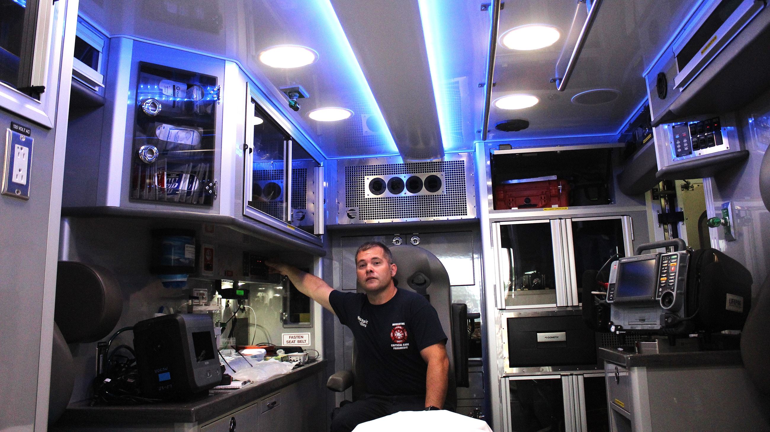 2025-07-21 New Ambulance interior with medic showing colored lights (JPG)