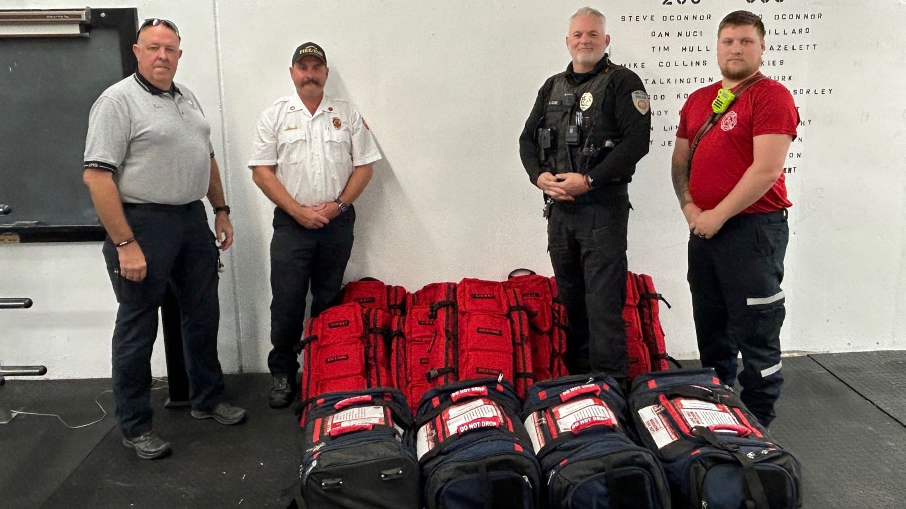 Mass Casualty Kits (JPG) showing regional service personnel and new kits